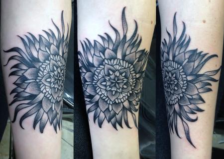 Robert Hendrickson - Sea inspired black flower tattoo 